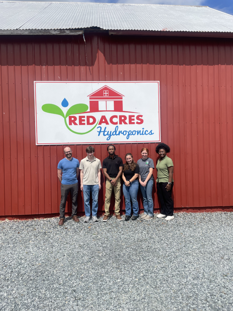 Interns at Red Acres Hydroponics